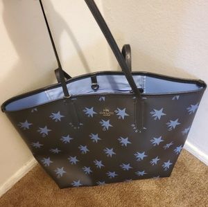 Beautiful coach purse with shooting stars